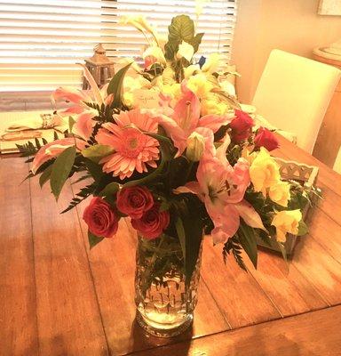 Beautiful flower bouquet with Stargazer Lillies, roses, daisies, etc