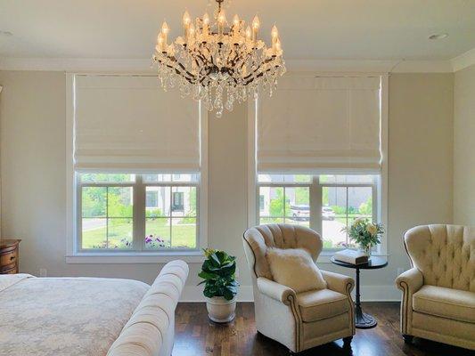 Grab some Zzzz's with our Blackout Roman Shades featured here in our Clients' Master Bedroom.