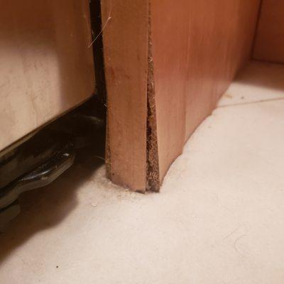 Water damage to cabinets from Fridge leak