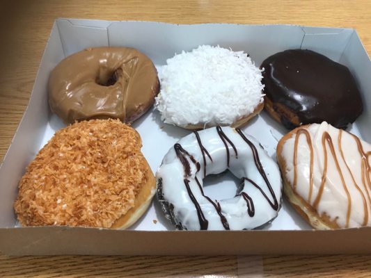 Maple donut, coconut donut, chocolate stuffed, coconut donut, apple pie filling