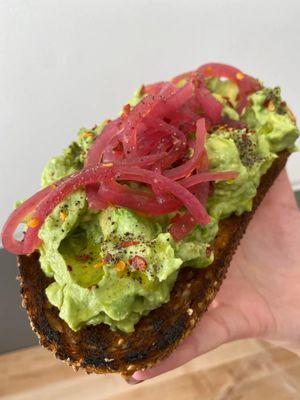 Avocado toast, muldon salt, crushed red pepper, truffle oil, pickled onion