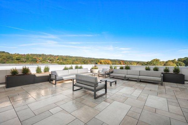 Taylor Vose has a 6,000 SF Landscaped sun deck with fire pits, water walls, tanning beds, and spectacular views!