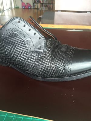 Repaired basket weave shoe.