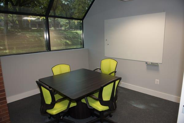 Private office - seats up to four with whiteboard.