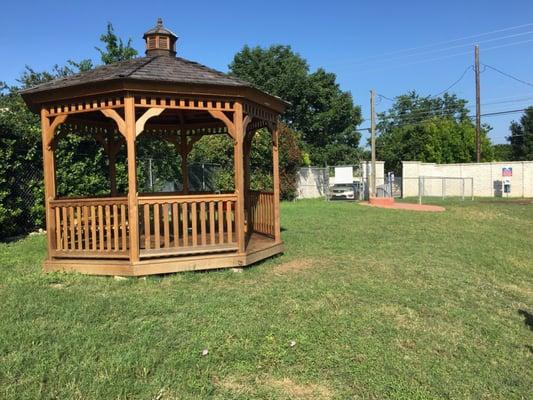 Newly built and extremely needed Gazebo! Providing some sort of shade and even has an electrical outlet :)