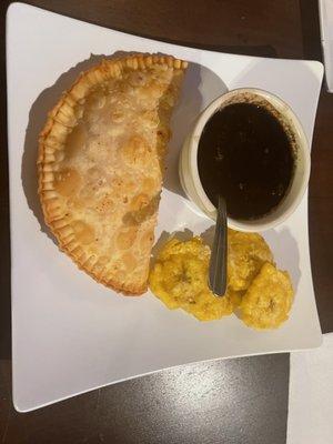 Pizza empanada, Tostones, black beans