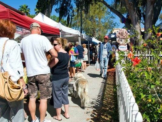 Visitors line the sidewalks of Beach Blvd. during Fresh Market Tuesdays.  Over 50 vendors offer a variety of choices.