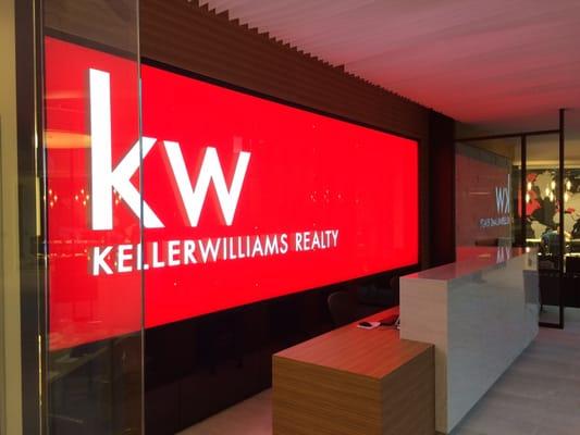 7'x22' glass wall whith channel letters and backlit with red leds