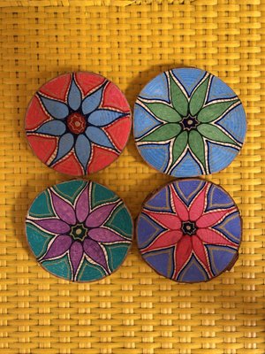 Hand drawn Floral coasters on natural wood slices