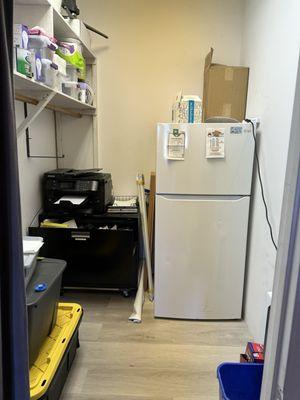 Supply closet and fridge