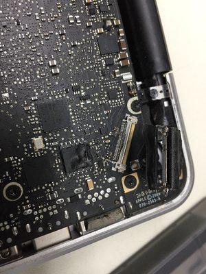 Example of a  damaged video flex cable on a MacBook Pro unibody that I can replace at ljjmtech