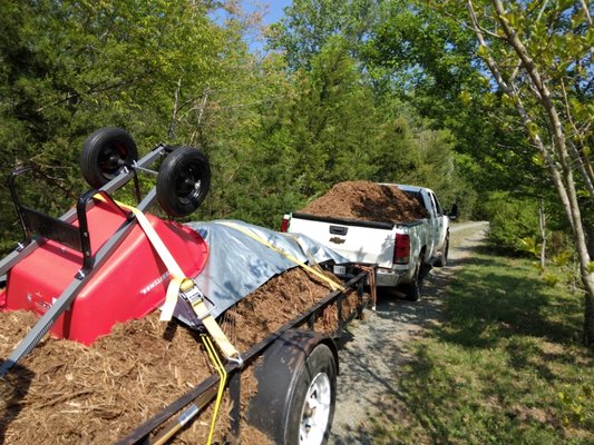 Truck and trailer of double ground hardwood mulch