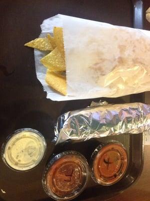 Steak burrito w/ chips & salsa & queso.