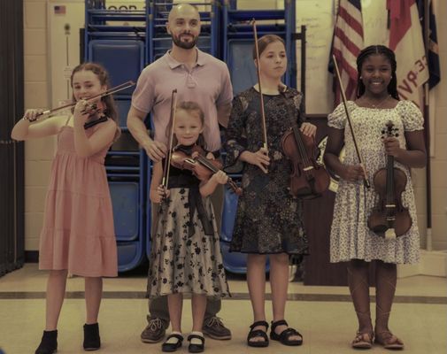 Mr. Patrick with several students after Fall Recital 2023