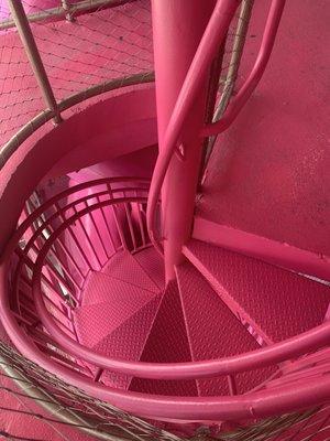 Pink spiral staircase