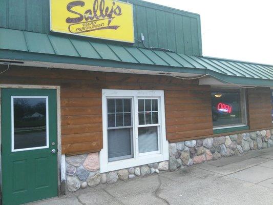 A street-side view of Sally's Family Restaurant and What Ta Pizza in White Cloud, MI 4/17/20