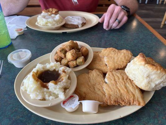 Chicken tenders, mashed potatoes with brown gravy, fried okra, biscuit.   Country fried steak, mashed potatoes with white potatoes.