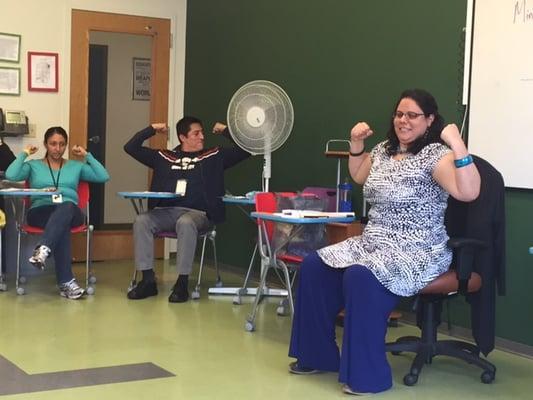 Shira teaching a workshop on reducing test-taking anxiety for teachers and school staff.