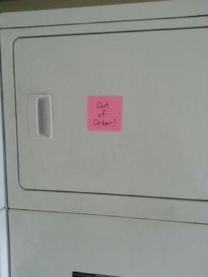 Broken dryer. At least the exclamation point adds some happiness