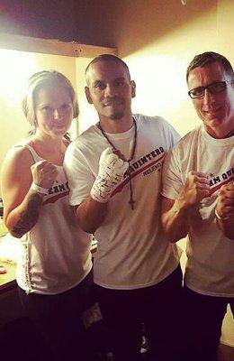 Laura Swain pictured here with pro boxer Arturo Quintero and legendary cut man/strength coach Mike Bazzel!