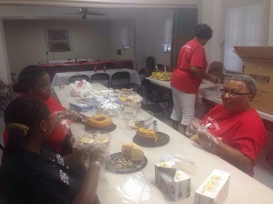 Ladies of the church getting ready for our fish plate sale!