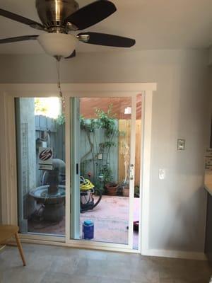 Old sliding glass door removed and new one installed, as well as the fan done by Carsh Builders.