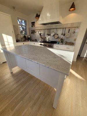 Carrara marble kitchen island