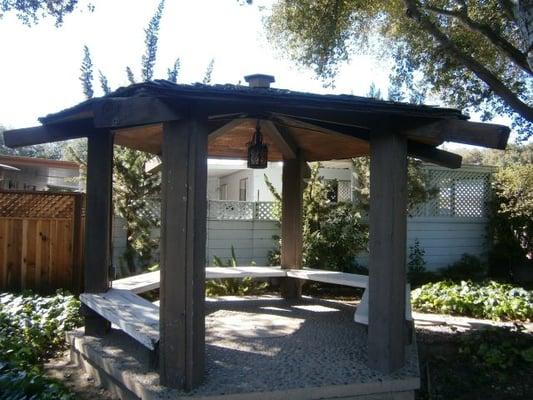 gazebo with example home in the background