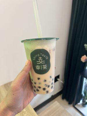 Black milk tea with boba, half sugar, iced