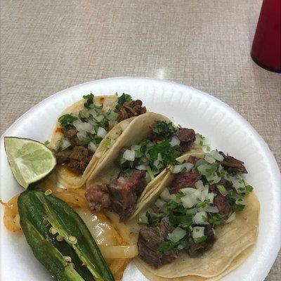 One tacó asada 2 of carnitas