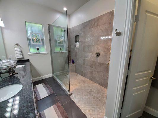 All new walk in shower.  Went from a tub/ shower combo to full, big shower.