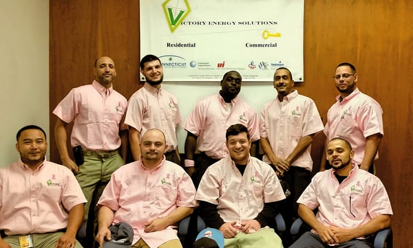 Victory Energy Solutions employees wear pink shirts in honor of Breast Cancer Awareness Month and donate to Susan G...