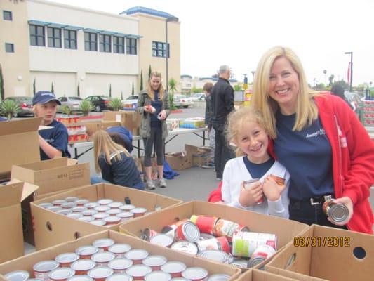 Volunteers packing food for residents