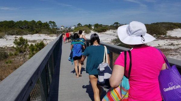 Long boardwalk with beautiful dunes