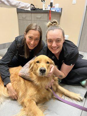 Dr. Calvarese and Halee giving great care to AnaBear.