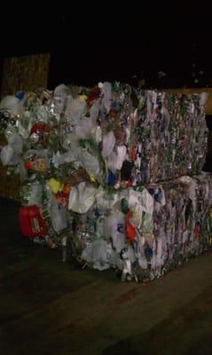 Baled plastics waiting to be shipped to mills in the US for processing