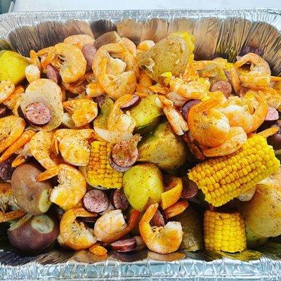 Low country boil! Shrimp, sausage, corn, potatoes and their homemade sauce. Delicious!