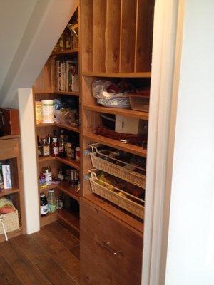 Under stairs pantry.