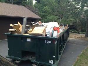 trash haul away in dumpster