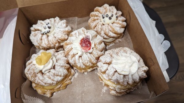 Zepole cannoli, custard zepole and strawberry zepole