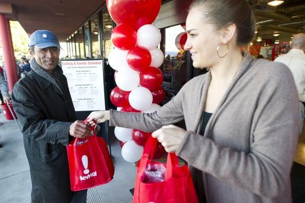 Opening Day: One of the First Customers gets a gift bag.