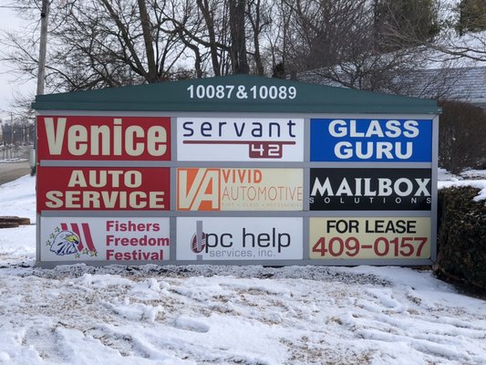 Closeup of our street sign visible as you drive by.