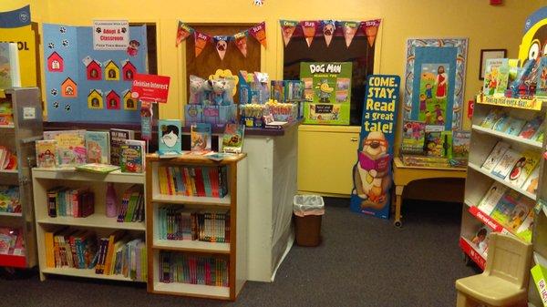 Children learn about the love of reading during the Scholastic Book Fair.