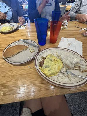 Pancake, stuffed biscuits and gravy, and omelette