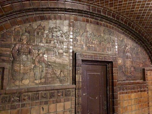 Batchelder tile frieze in rear section beneath groin vault