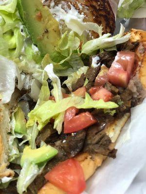 Beef Torta with avocado, tomato, lettuce with sour cream or Mayo!