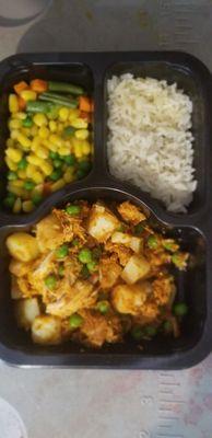 Chicken Curry, rice and mixed vegetables.