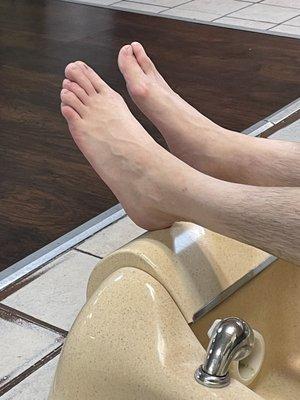 Job well done. Man pedicure. His feet look soooo much better.