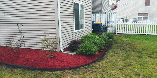 Out with the old, in with the new. Fresh Mulch. Plus New Border