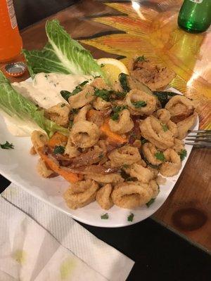 The calamari is different yet unique as it also has fried pieces of zucchini and sweet potato the tartar sauce has a tang to it!!